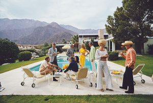 "Poolside Social" C-type photograph by Slim Aarons. Copyright of Slim Aarons, Getty Images Gallery